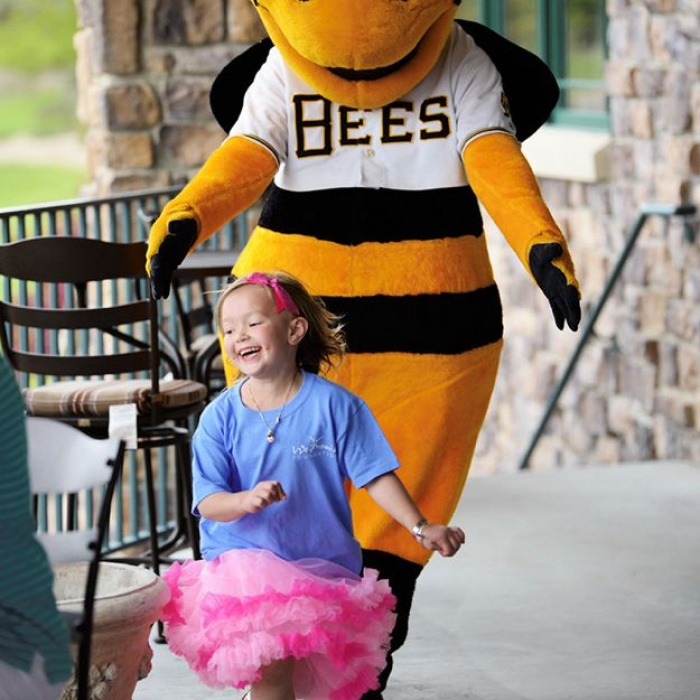 Bees mascot and hero kid playing